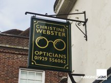 opticians hanging sign